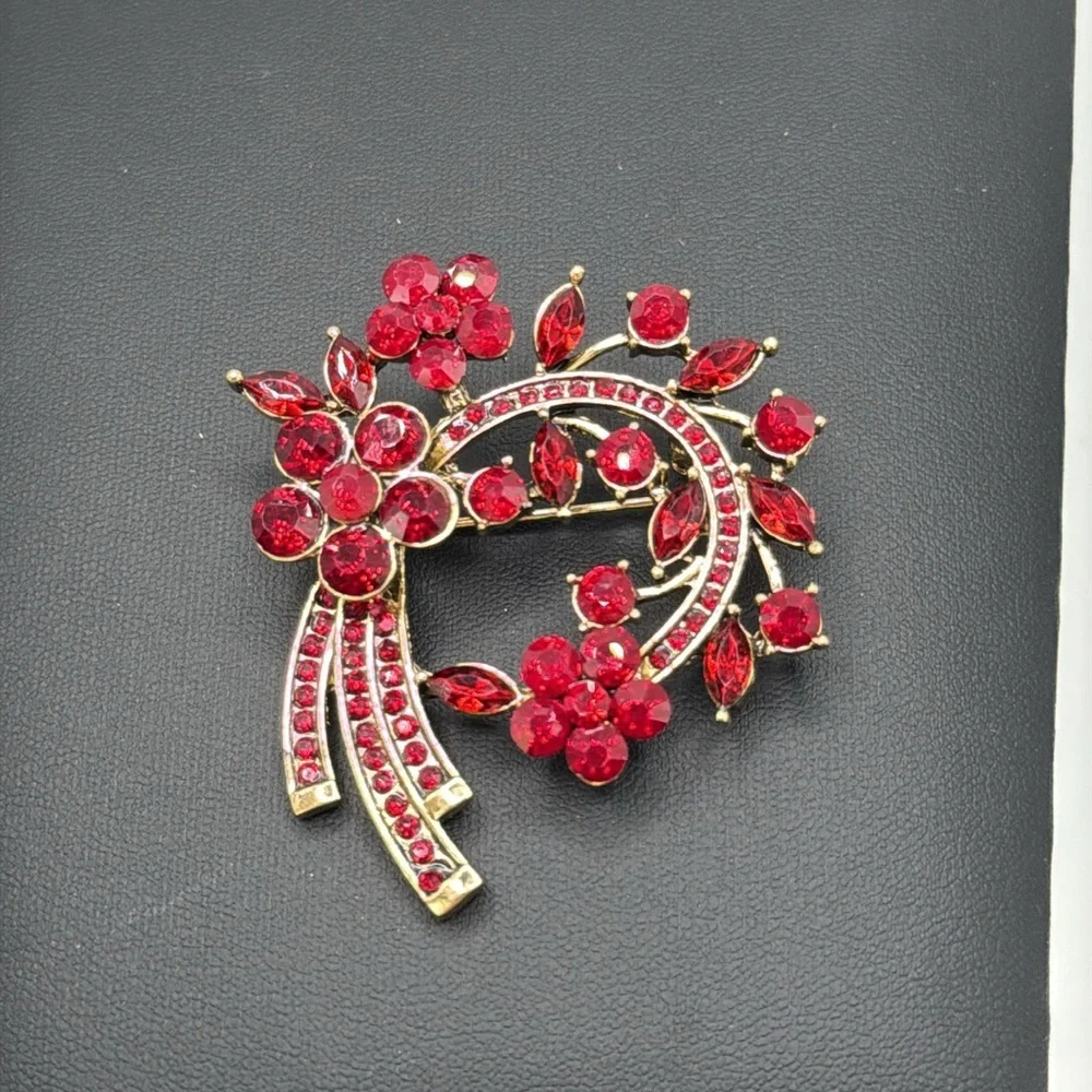 Beautiful red rhinestone statement brooch and complimentary hair barrettes
